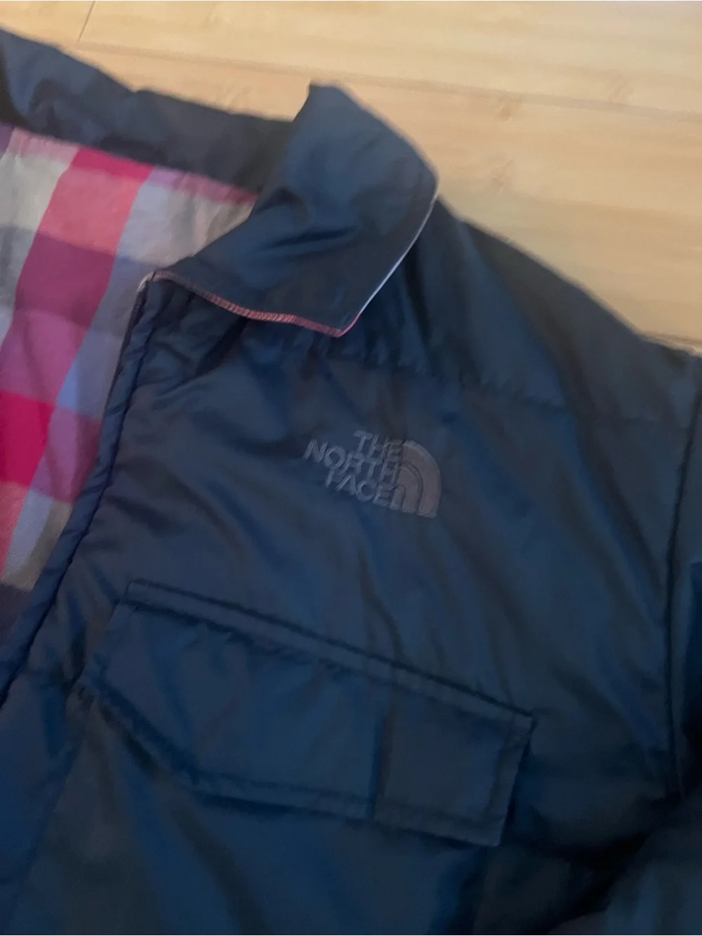 The North Face reversible padded jacket black and buffalo plaid flannel Large